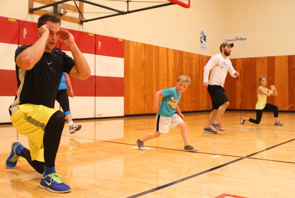 Photo by Kelly Sullivan/Peninsula Clarion Nathan Byrd held his first community benefit boot camp, Saturday, June 28, at the Kenai Recreation Center. The camp will be held once a month. The cost to participate is three cans of food to be donated to the Kenai Peninsula Food Bank.