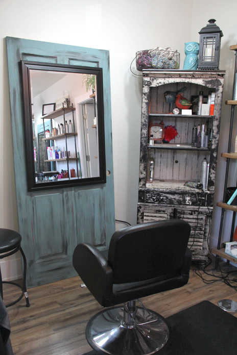 Northern Roots Salon owners Janey Skuse and Summer Durst painted doors from Home Depot and mounted mirrors on them for their styling stations. The duo opened the salon at Shops Around the Corner in Soldotna in April. Photo by Kaylee Osowski/Peninsula Clarion