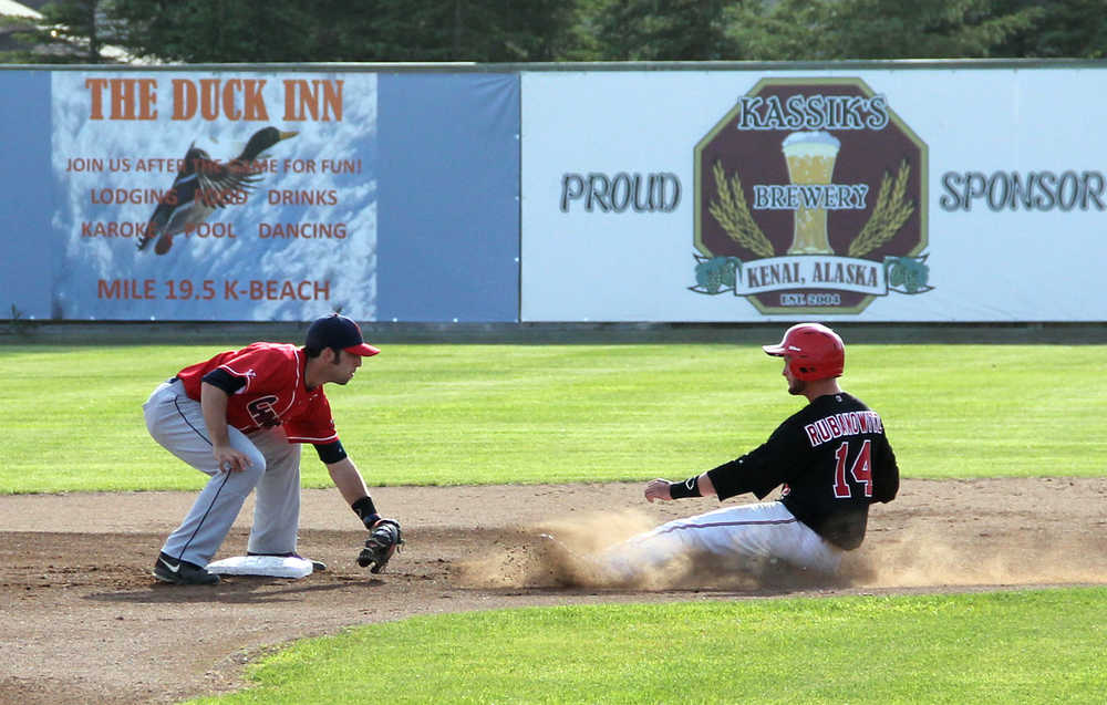 Photo by Dan Balmer/Peninsula Clarion Peninsula Oilers third baseman Alex Rubanowitz is caught stealing at second base in the second inning in Thursday's game against the the Chugiak-Eagle River Chinooks at Coral Seymour Memorial Park.