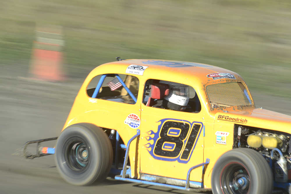 Photo by Rashah McChesney/Peninsula Clarion .... takes off on a straightaway during a Legends car race Friday July 4, 2014 at the Twin Cities Raceway in Kenai, Alaska.