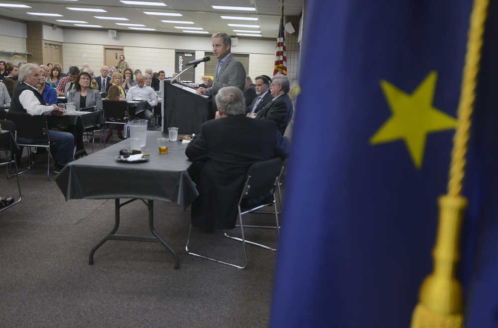 Photo by Rashah McChesney/Peninsula Clarion Alaska Governor Sean Parnell address a crowd of more than 100 Tuesday July 7, 2014 during a joint chamber luncheon at the Soldotna Regional Sports Center. Parnell signed 11 bills into law during the meeting.