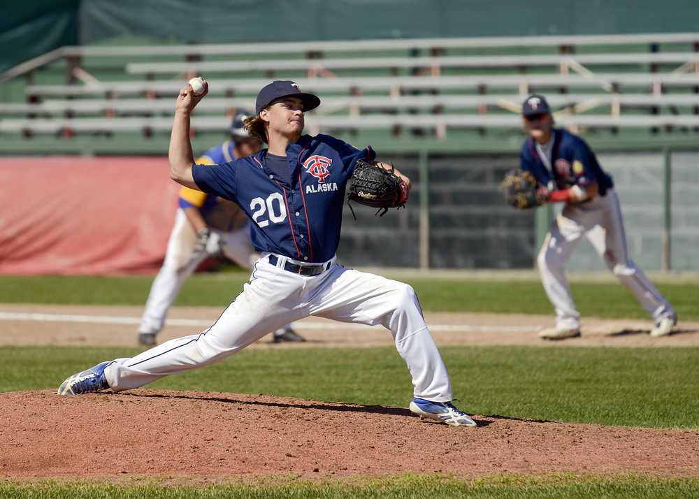 Photo by Rashah McChesney/Peninsula Clarion  Klayton Justice pitches during a Twins game against Bartlett Saturday July 19, 2014 in Kenai, Alaska.