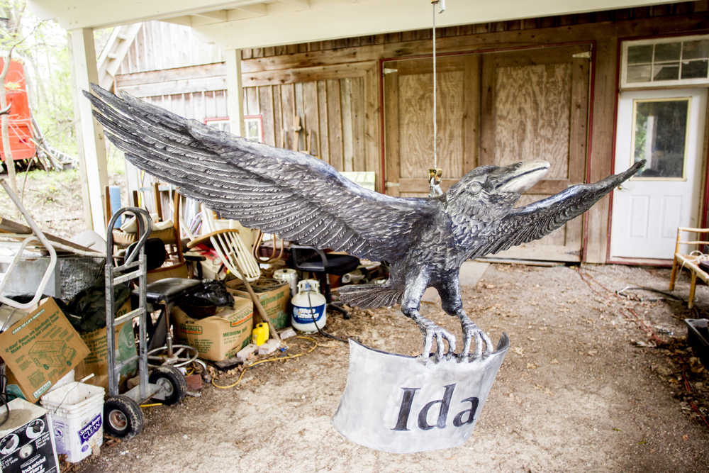 Artist John Coyne is working on a raven sculpture at his studio in Iowa City for the Dena?ina Wellness Center in Kenai, Alaska. Through his research of Dena?ina culture, Coyne chose to combine the iconic birds with the tribe?s words.   Benjamin Roberts / P-C A finished raven sculpture completed by artist John Coyne at his studio in Iowa City, IA, on Thursday, May 22, 2014. Coyne, a native of Fairbanks, AK, is currently crafting a series of metal sculptures resembling a Raven, a bird iconic to Alaska and the DenaÕina people, where the bird has a strong influence the culture's songs and poetry.