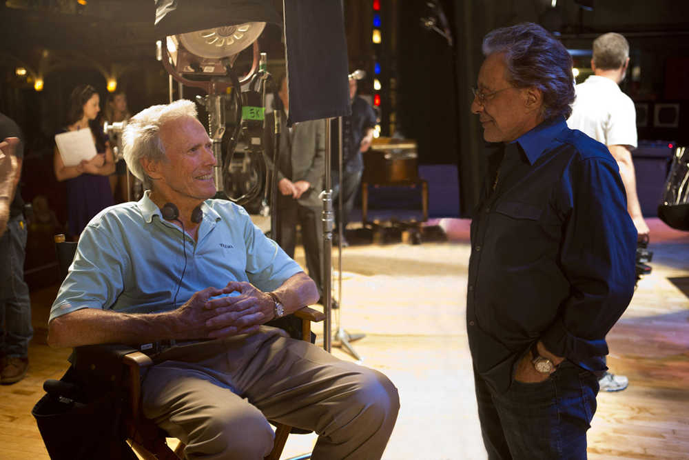 FILE - This photo released by Warner Bros. Pictures shows director/producer, Clint Eastwood, left, and executive producer Frankie Valli on the set of Warner Bros. Pictures' musical "Jersey Boys," a Warner Bros. Pictures release. The big-screen adaptation of the hit Broadway musical "Jersey Boys" is Eastwood's 12th film as a director since turning 70. (AP Photo/Warner Bros. Pictures, Keith Bernstein, file)