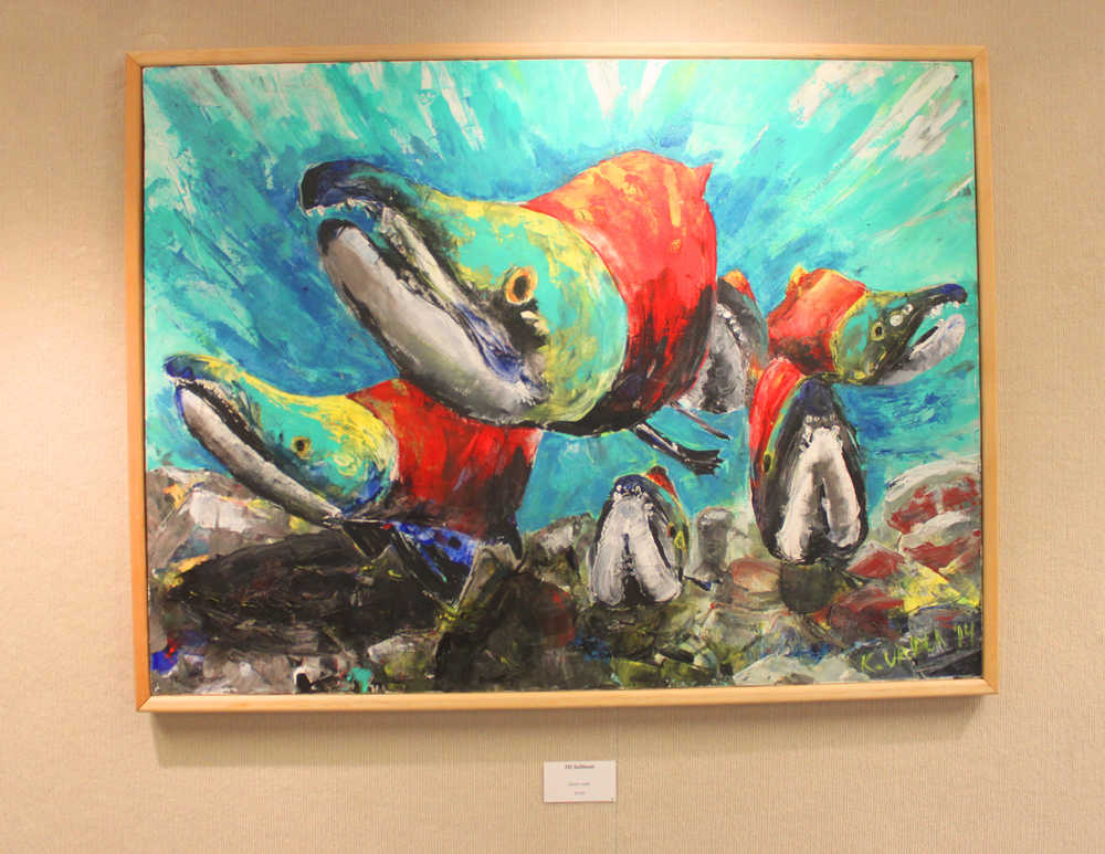 Photo by Kelly Sullivan/ Peninsula Clarion Kaitlin Vadla said she choses the subjects in her paintings if it is something that has personal meaning for her, Thursday, July 24, at the Kenai Fine Arts Center.