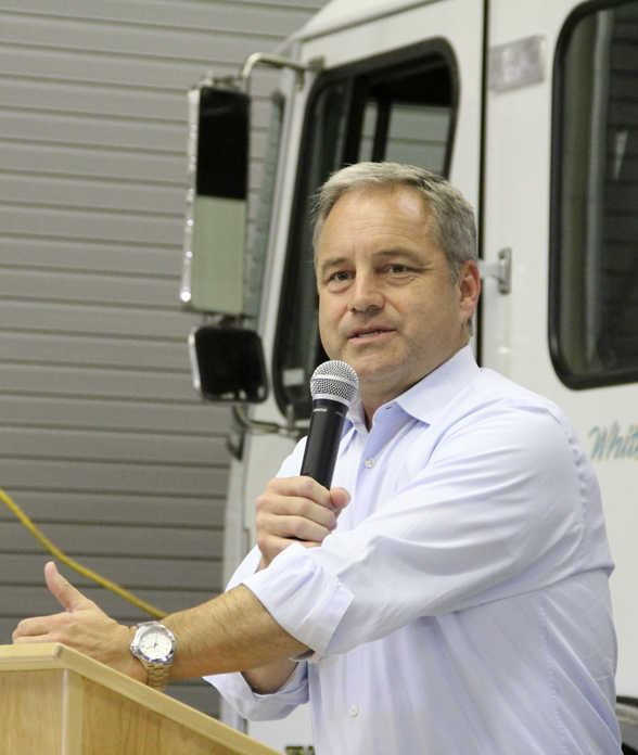 Gov. Sean Parnell speaks at Tesoro's Nikiski refinery prior to signing House Bill 287 into law. The bill extends Tesoro's contract with the State of Alaska to purchase royalty oil and gives in-state refineries a tax credit for infrastructure investment. Photo by Kaylee Osowski