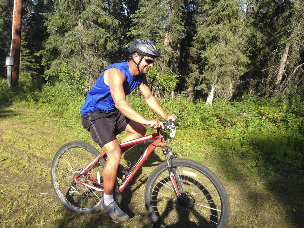Contributed photo by Tsalteshi Trails Association Tony Eskelin finished fourth with a time of 28:05 during the fourth Salmon Cycle Series race Thursday July 31, 2014 on the Tsalteshi Trails in Soldotna, Alaska.