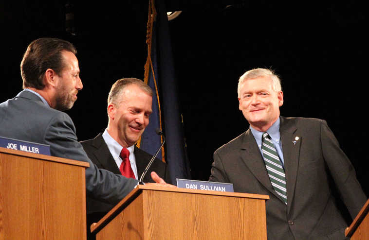 Alaska Republican U.S. Senate candidates Joe Miller left, Dan Sullivan, middle, and Mead Teadwell greet before a live televised debate Sunday, Aug. 10, 2014, in Anchorage, Alaska. Thousands of miles from the U.S-Mexico border, the major Republican candidates for U.S. Senate in Alaska clashed on immigration in a televised debate. (AP Photo/Mark Thiessen)