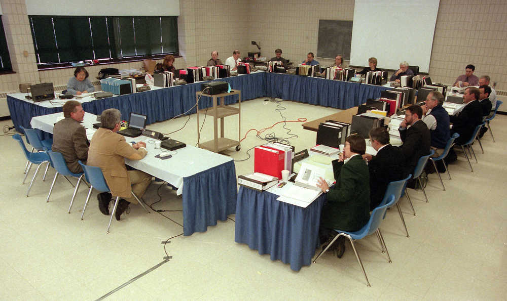 Members and staff of the Alaska Board of Fisheries meet in Soldotna Feb. 16, 1999. The 1999 meeting was the last time the full board met on the central Kenai Peninsula to address upper Cook Inlet fisheries. (Clarion file photo)