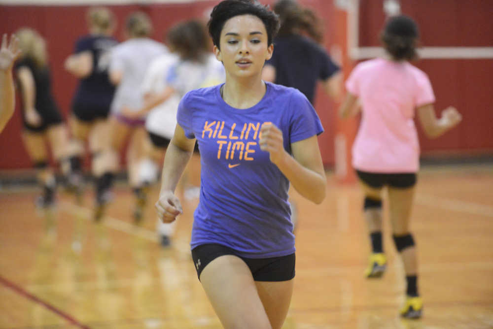 Kelly Sullivan/ Peninsula Clarion Kyla Whannell sprints across the gym, Thursday, August 29, 2014, during the Kenai Central High School girls varsity volley ball practice, at Kenai Central High School, in Kenai, Alaska.