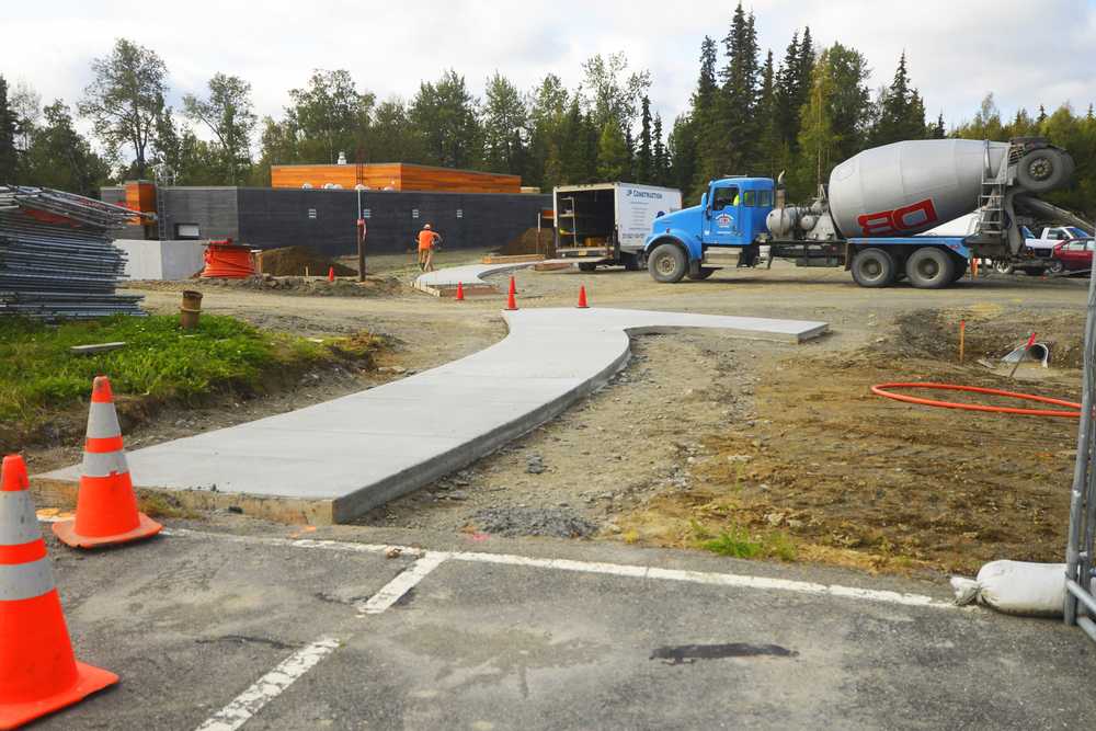 Photo by Kelly Sullivan/ Peninsula Clarion Construction at the new Kenai Visitors Center is moving forward with a new opening date pushed back until late December of this year, or early January of 2015, Friday, September 3, 2014, at the Kenai Wildlife Refuge in Soldotna, Alaska.