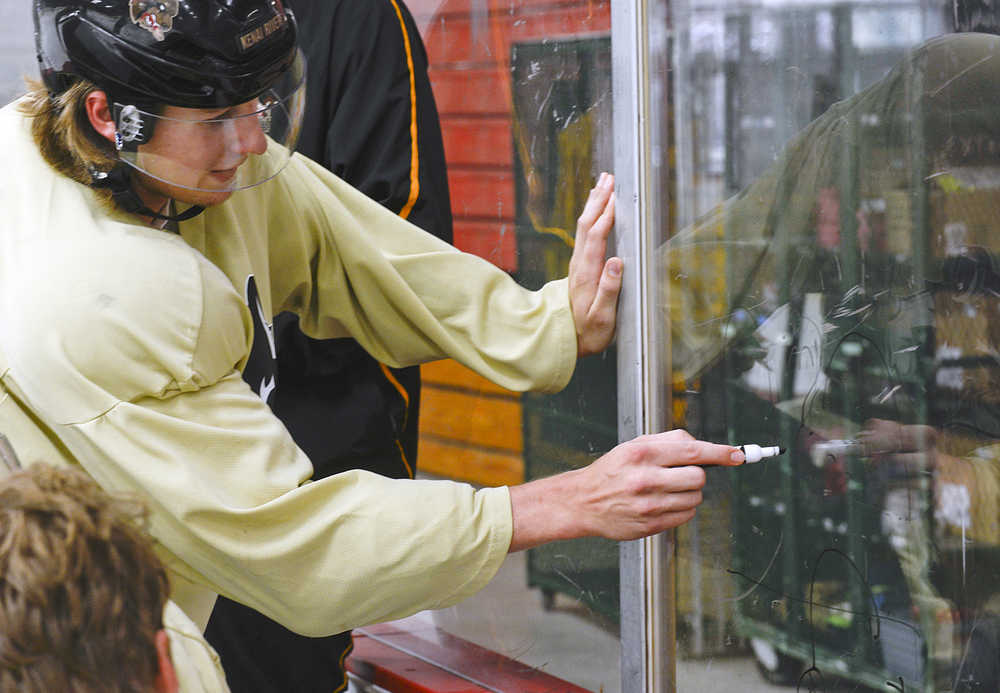 Photo by Rashah McChesney/Peninsula Clarion  Members of the Kenai River Brown Bears ice hockey team run through a drill during practice Thursday September 11, 2014 in Soldotna, Alaska.