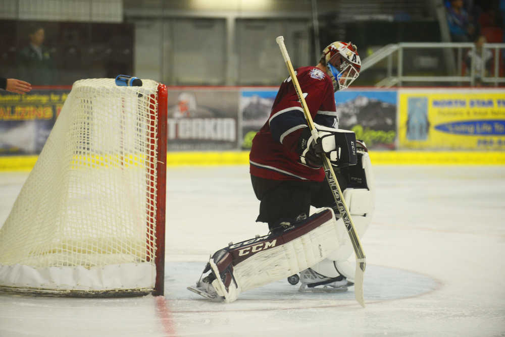 Photo by Kelly Sullivan/ Peninsula Clarion Fairbanks Ice Dogs' goalie Patrick Munson misses a puck, Friday, September 12, 2014, at the Soldotna Regional Sports Complex in Soldotna, Alaska.
