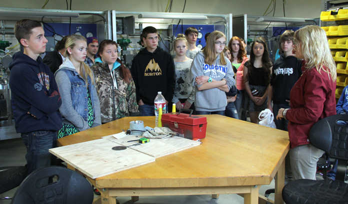 Soldotna Prep students listen to their guide as they tour the Career and Technical Education Center on Kenai Peninsula College's Kenai River Campus on Sept. 9. The freshmen visited KPC to kick off the Career Pathways Program for the year. Photo by Kaylee Osowski/Peninsula Clarion