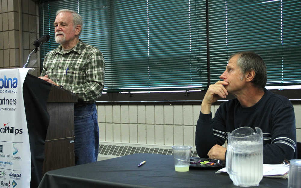 Photo by Kaylee Osowski/Peninsula Clarion Kenai Peninsula Borough assembly member Bill Smith (left) discusses the borough ballot proposition, which asks voters if the borough should hold elections by mail on Tuesday at the Kenai and Soldotna Chambers joint luncheon at the Soldotna Regional Sports Complex. Assembly member Brent Johnson (right) spoke to luncheon attendees about a proposition asking voters if the borough should exercise and fund limited animal control powers. The propositions will be on the Oct. 7 ballot.