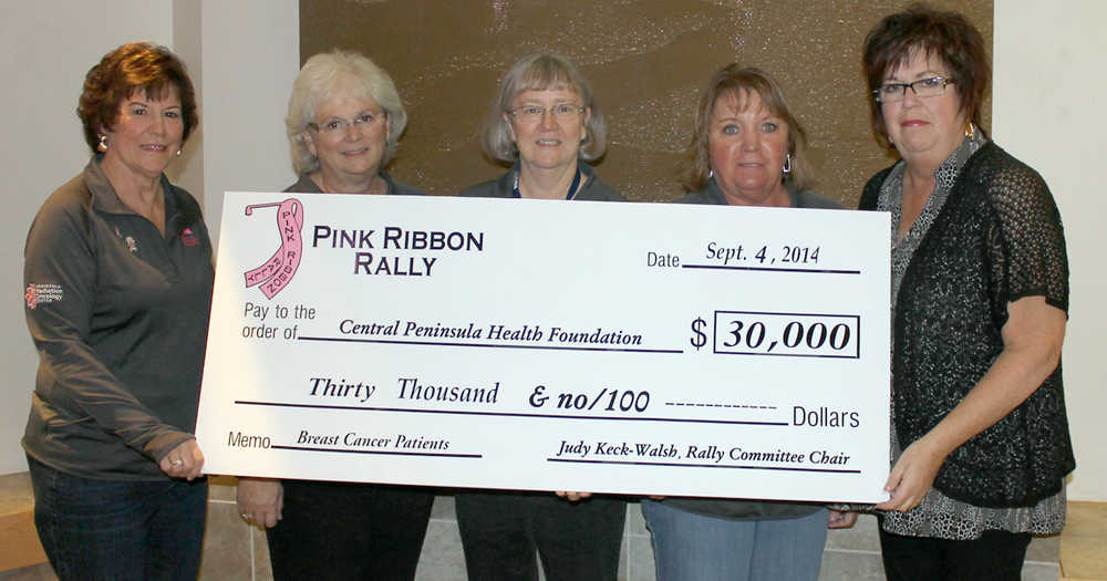 On Sept. 4, the Pink Ribbon Rally Committee presented a check in the amount of $30,000 to the Central Peninsula Health Foundation Breast Cancer Fund to be used for local breast cancer patients and to further awareness and prevention of this devastating disease. These funds were raised as a result of the 9th annual Pink Ribbon Rally Golf & Fundraising Event held at the Birch Ridge Golf Course on August 10. Pictured from left to right: Sharon Keating, Judy Imholte, Kathy Gensel (CPHF Director), Sally Hoagland and Judy Keck-Walsh (Rally Committee Chair). Committee member not pictured: Barb Winkler. Join the Pink Ribbon Rally Group on Facebook to see pictures from the event. (Submitted photo)