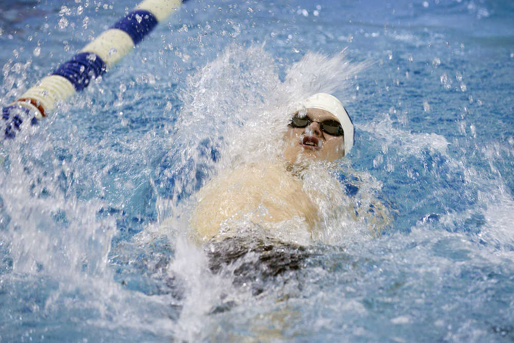 Photo by Rashah McChesney/Peninsula Clarion Soldotna's Jacob Creglow swims during a 50-yard backstroke competition Friday September 19, 2014 during the Sohi Pentathalon in Soldotna, Alaska.