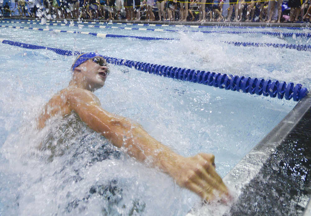 Photo by Rashah McChesney/Peninsula Clarion Kodiak's Talon Lindquist touches the edge of the pool while competing in the 50 yard breaststroke during the 2014 Sohi Pentathalon in Soldotna, Alaska. Lindquist placed second in the heat.