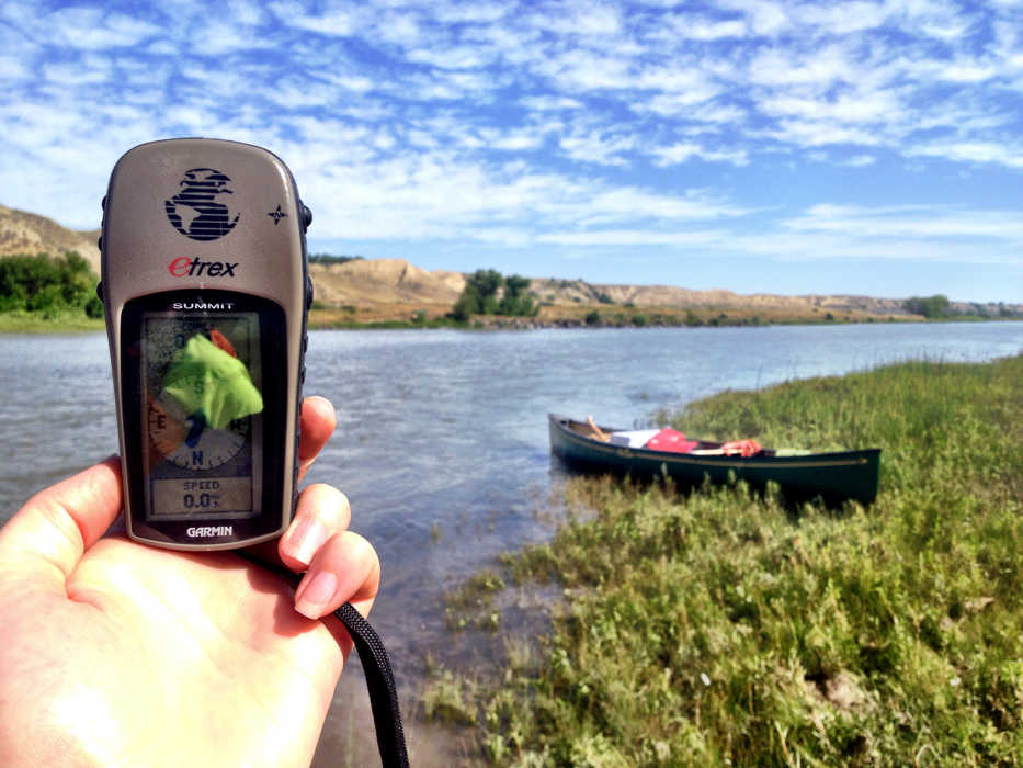 In an Aug. 28, 2014 photo, a GPS device is shown along the Missouri River near Fort Benton, Mont. The Upper Missouri Breaks Interpretive Center recently established an EarthCache trail along the Wild and Scenic Upper Missouri River.(AP Photo/Great Falls Tribune, Erin Madison)