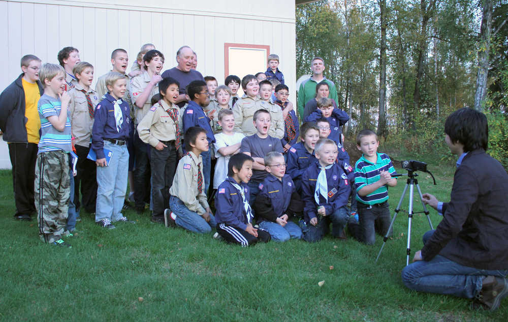 Dr. Takeshi Toriyama, of Japan, takes a video on Tuesday outside the Soldotna United Methodist Church of the Boy Scouts of America Troop 669 wishing the victims of the 2011 tsunami in Japan "good luck" in their ongoing effort to rebuild after the devastating disaster. Photo by Kaylee Osowski/Peninsula Clarion