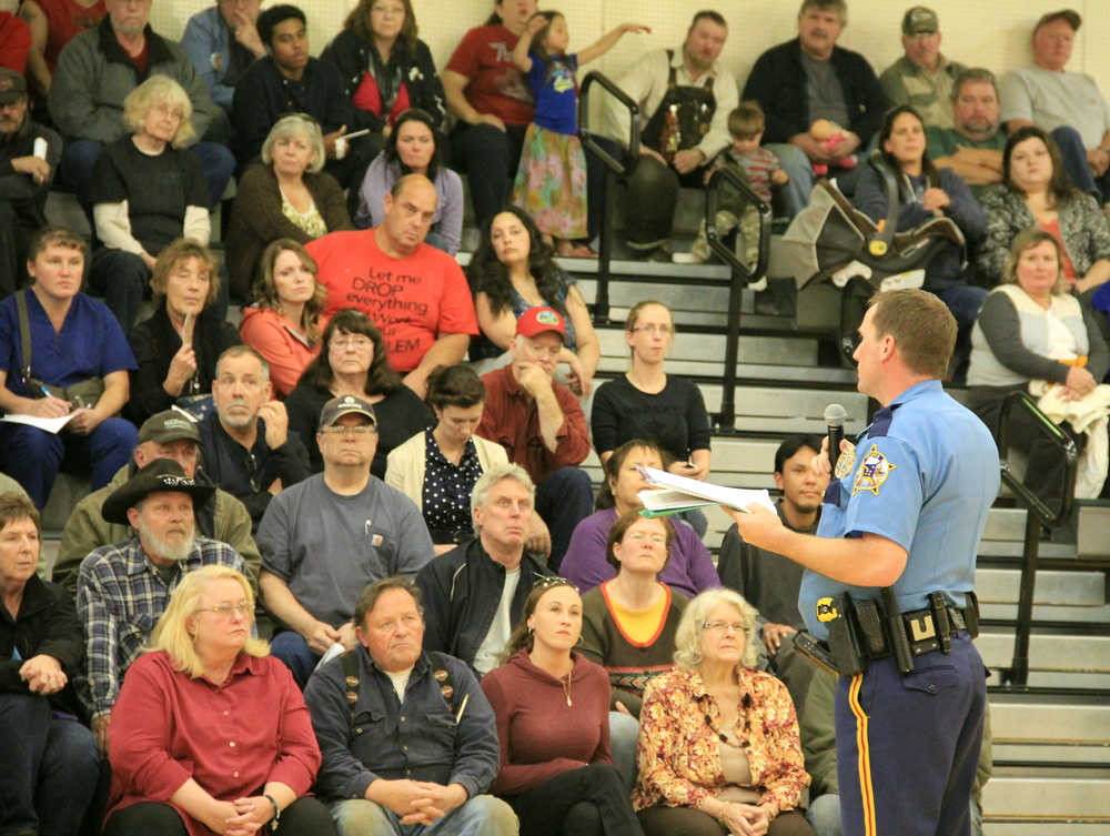 Photo by Dan Balmer/Peninsula Clarion Captain Andy Greenstreet, E-detachment commander, addressed the concerns Nikiski resident have with recent property crimes at a town hall meeting at the Nikiksi Recreation Center Wednesday. Greenstreet announced the formation of a crime suppression unit of two troopers that will concentrate on theft investigations in the Nikiksi area.