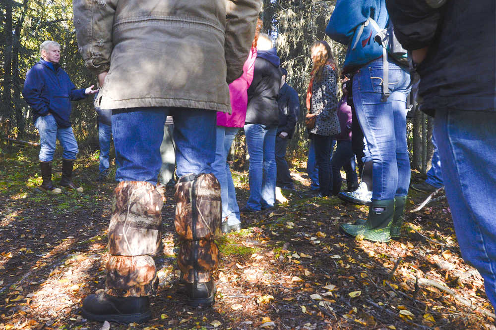 Photo by Rashah McChesney/Peninsula Clarion Kenai Peninsula College Professor of Anthropology, Alan Boraas, talks to a class during a walk near the college Thursday September 25, 2014 in Soldotna, Alaska. Boraas took students and faculty members to several historical Dena'ina sites along Slikok Creek and the Kenai River.