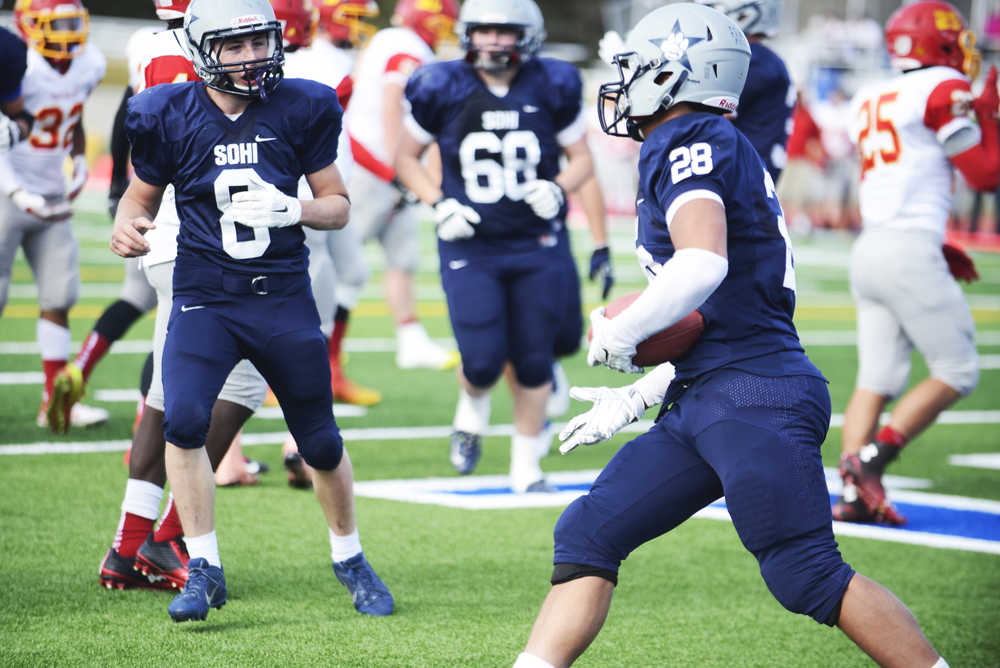 Photo by Kelly Sullivan/ Peninsula Clarion Soldotna Stars Jared Chavez reacts to Drew Gibbs touchdown in the game against Faribanks' West Valley Wolf Pack, Saturday, September 27, 2014 at Soldotna High School in Soldotna, Alaska.