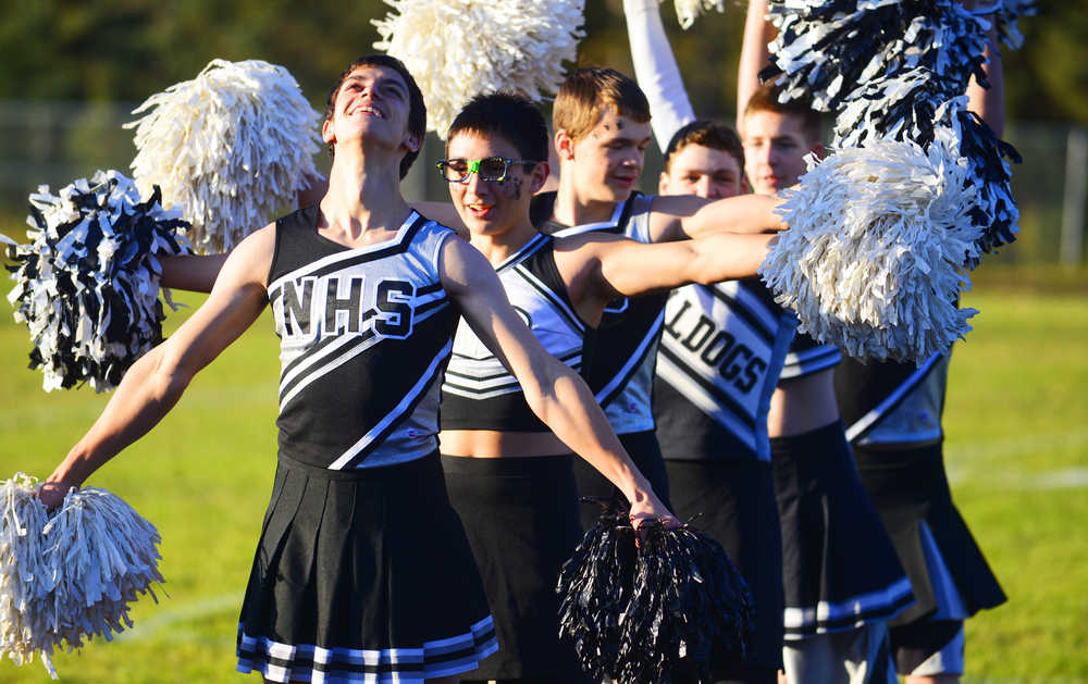 Photo by Kelly Sullivan/ Peninsula Clarion At the Nikiski High School-Middle School Powder Puff flag football game one of the the school's homecoming week activities, the High School Senior and Freshmen girls competed against the Juniors and Sophomores, while the boys took on the role of cheerleaders, Thursday, September 25, 2014 in Nikiski, Alaska.