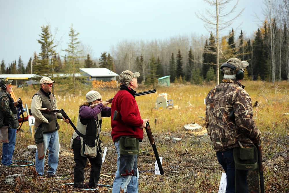 Photo courtesy Steve Meyer A team of five participate in a round of clay pigeon shooting at the Shoot for the Cure fundraiser event Saturday, Oct. 4, 2014 at the Snowshoe Gun Club in Kenai. The event, which began eight years ago in Anchorage to raise awareness for Cystic Fibrosis, was held on the Kenai Peninsula for the first time this year.