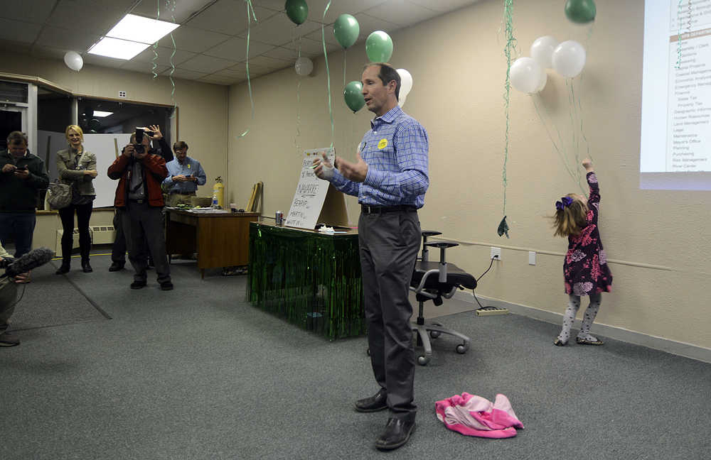 Photo by Rashah McChesney/Peninsula Clarion  Adele Bearup gives "Bear Oscars" to guests at her husband Tom Bearup's election night party October 7, 2014 in Soldotna, Alaska. Tom Bearup ran an unsuccesful campaign for Kenai Peninsula Borough Mayor.