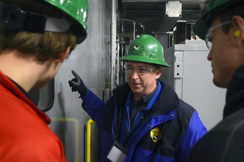 Photo by Rashah McChesney/Peninsula Clarion Jim Kingrey, power plant superintendent for the Homer Electric Association, gives a tour of the company's Soldotna Combustion Turbine Plant Wednesday October 8, 2014 in Soldotna, Alaska.