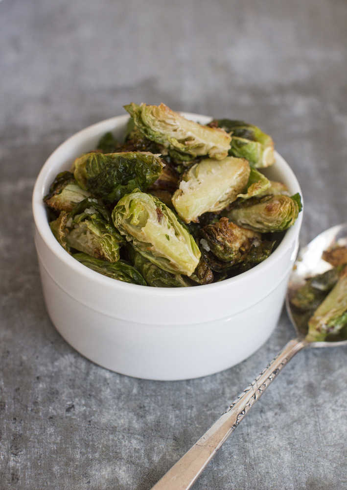 This Sept. 22, 2014 photo shows fried Brussels sprouts in Concord, N.H. Chic menus at restaurants around the country have begun serving Brussels sprouts after kale introduced Americans to the idea that there actually are many ways to prepare most vegetables. (AP Photo/Matthew Mead)