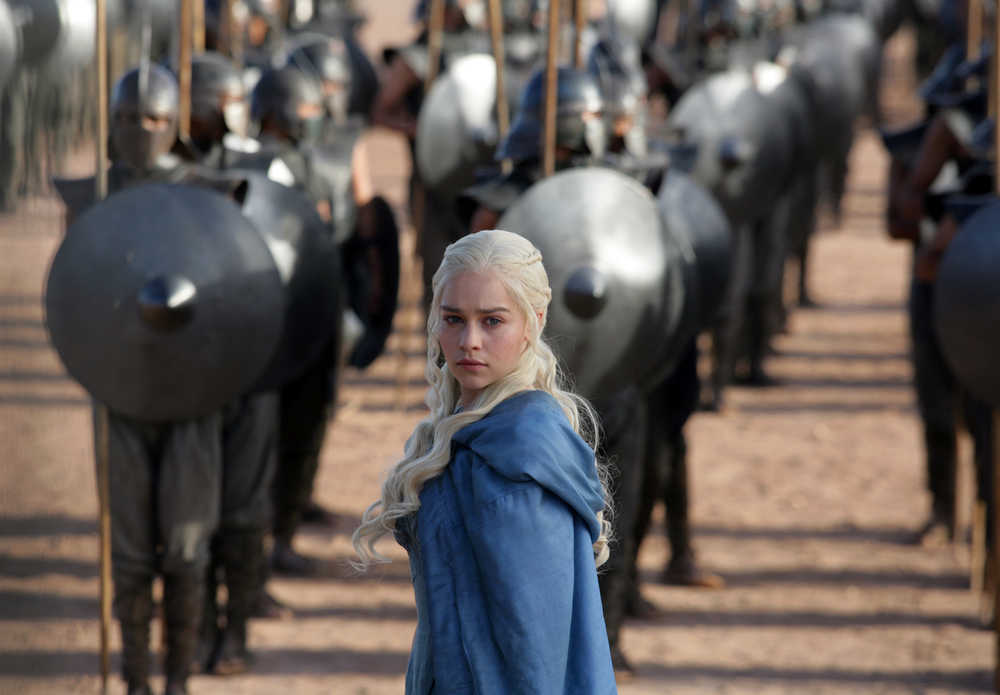 FILE - This file publicity image released by HBO shows Emilia Clarke as Daenerys Targaryen in a scene from "Game of Thrones."   HBO plans to offer a stand-alone version of its popular video-streaming service, CEO Richard Plepler said at an investor meeting at parent Time Warner Inc. on Wednesday, Oct. 15, 2014. (AP Photo/HBO, Keith Bernstein, File)