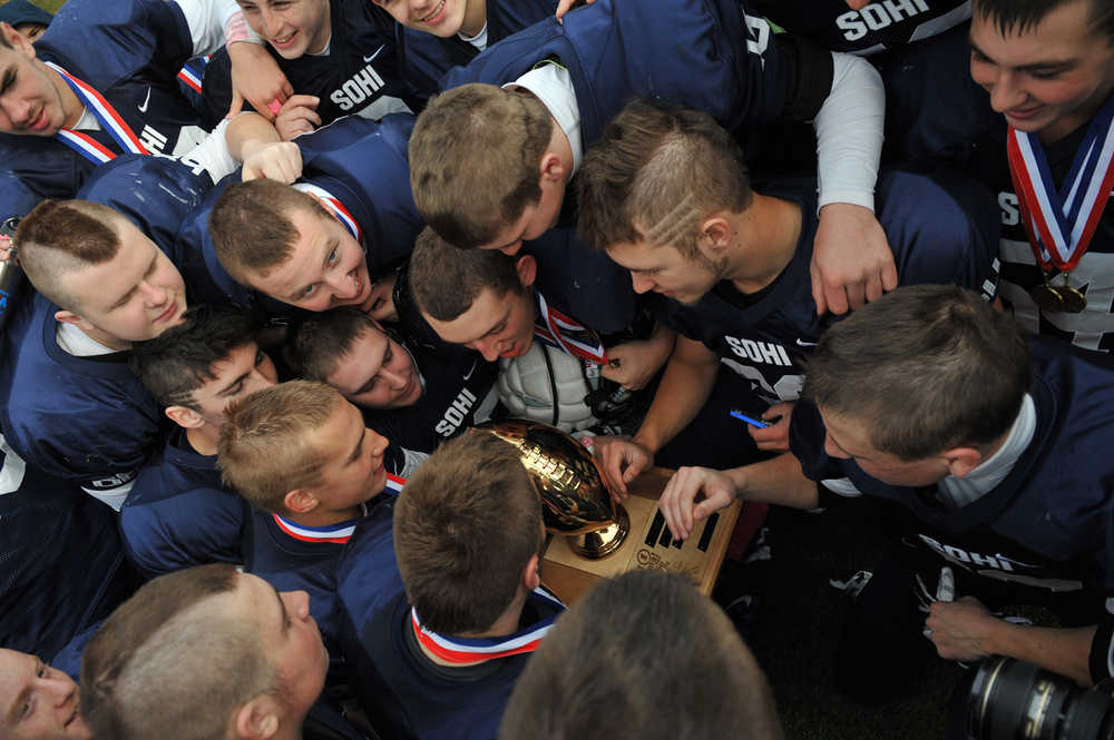 SoHi team members with the championship trophy.  Photo for the Clarion by Michael Dinneen