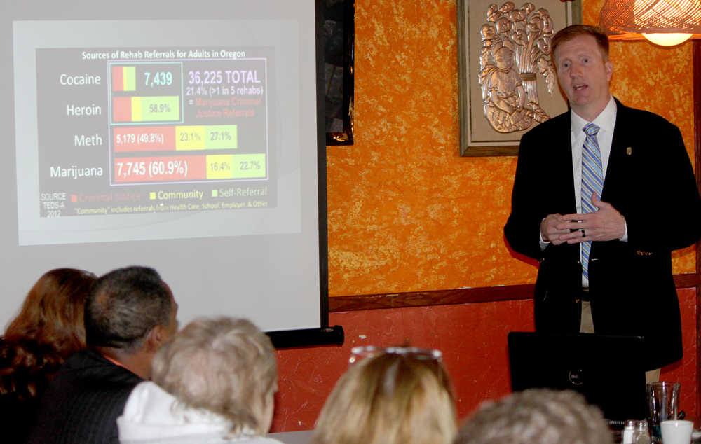 Photo by Dan Balmer/Peninsula Clarion Larry Kirk, with Law Enforcement Against Prohibition (LEAP) speaks to members of the Kenai Rotary Club Monday at Don Jose's Restaurant in Kenai. Kirk, a police chief with Old Monroe Police Department in Missouri, said the social impacts of marijuana arrests have negatively impacted every state in the country.
