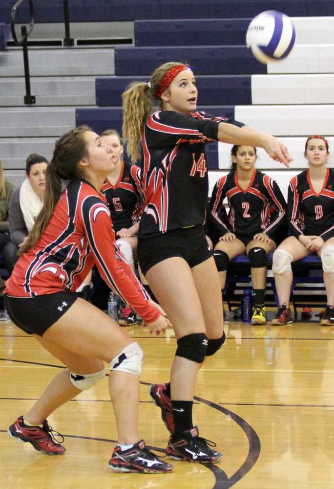 Kenai's Amber Walter steps up to collect a dig during a loss to Soldotna early in the Northern Lights Conference Championships at Palmer High School. Kenai finished 0-2 in the tournament.