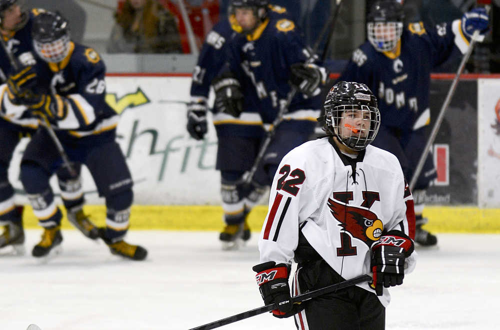 Photo by Rashah McChesney/Peninsula Clarion Kenai Central High School Kardinal Matt Hegel skates to his bench after the Homer High School Mariners score a goal during their game on Friday Nov. 7, 2014 in Sodotna, Alaska.