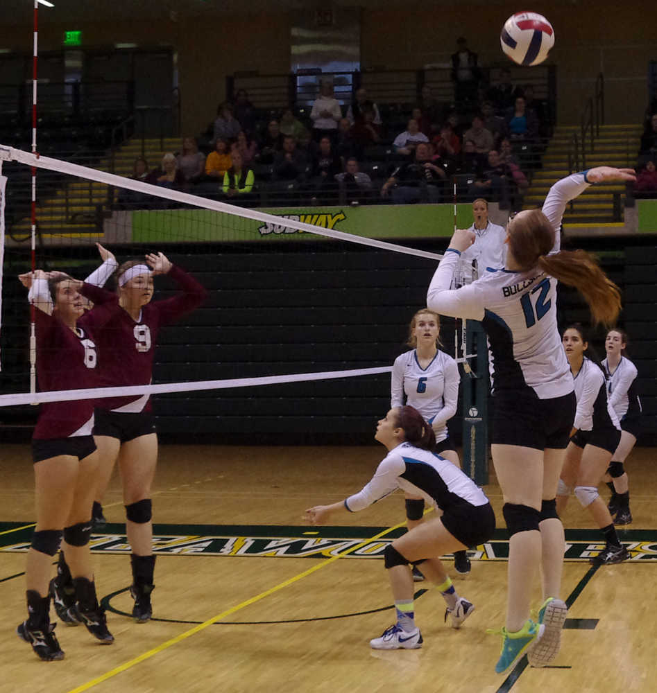 Photo by Molly Dischner/For the Clarion Nikiski's Melanie Sexton attacks Saturday against Grace Christian at the Class 3A state tournament at the Alaska Airlines Center in Anchorage.