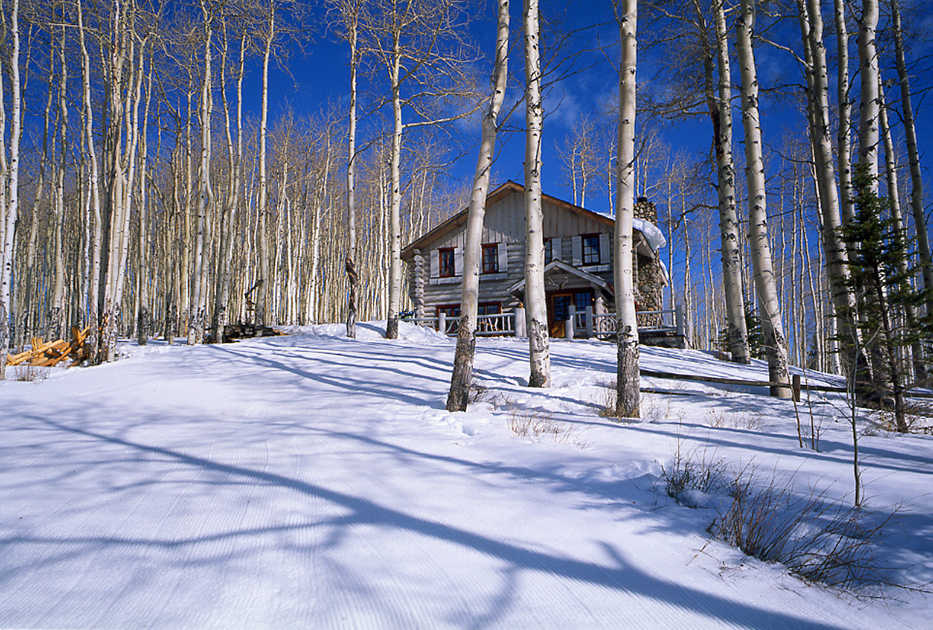 This undated image provided by Beaver Creek Resort shows Trappers Cabin at Beaver Creek near Avon, Colo. Five nights at the cabin, with a concierge and chef, is part of a $50,000 white-glove package for four offered by the resort that includes season passes to 22 mountains owned by or partnered with Vail Resorts, first-class airfare from within the U.S., a private helicopter from the airport to the resort, and ski equipment and lessons. (AP Photo/Beaver Creek)