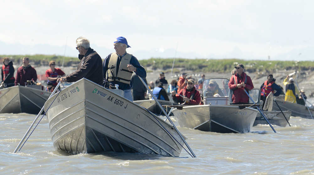 Photo by Rashah McChesney/Peninsula Clarion  In this July 14, 2014 file photo, people fishing with dipnets in the largest personal-use fishery in Alaska, crowd near the Kenai City Docks as they work to net some of the millions of sockeye that run on the Kenai River every year. The City of Kenai has been tasked with managing the massive fishery and made several changes, including adding enforcement, during the 2014 season.