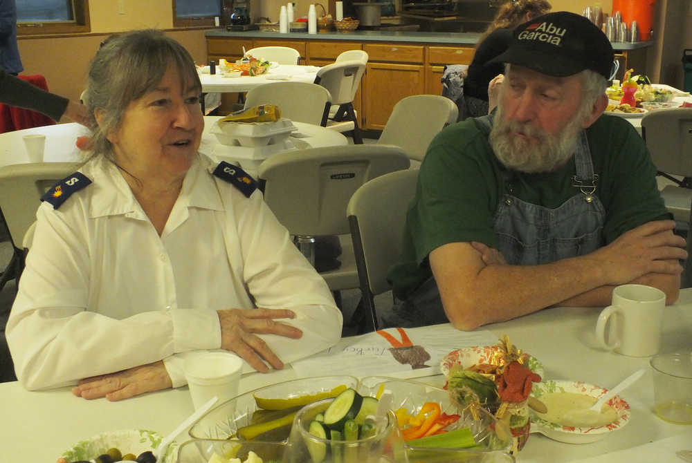 Ben Boettger/Peninsula Clarion Meal organizers Jeannie Fanning and Paul Canevan at the Salvation Army Community Dinner on Nov. 27