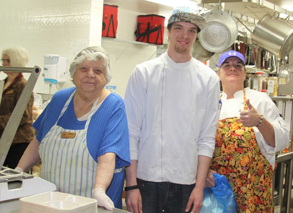 Hilcorp employees treat Kenai Seniors to pre-Thanksgiving dinner