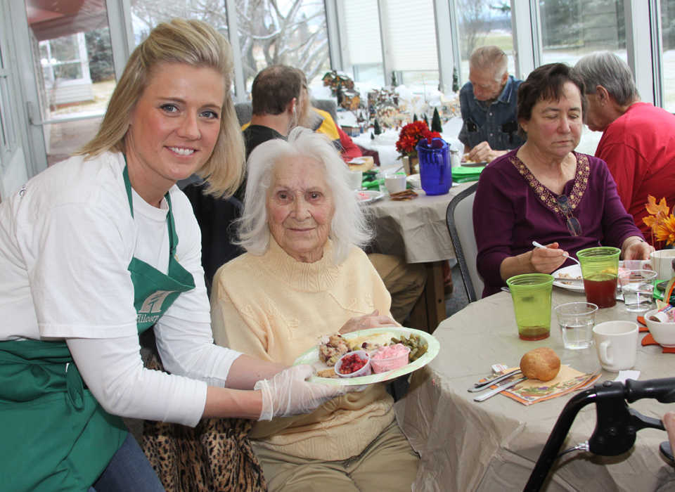 Hilcorp employees treat Kenai Seniors to pre-Thanksgiving dinner