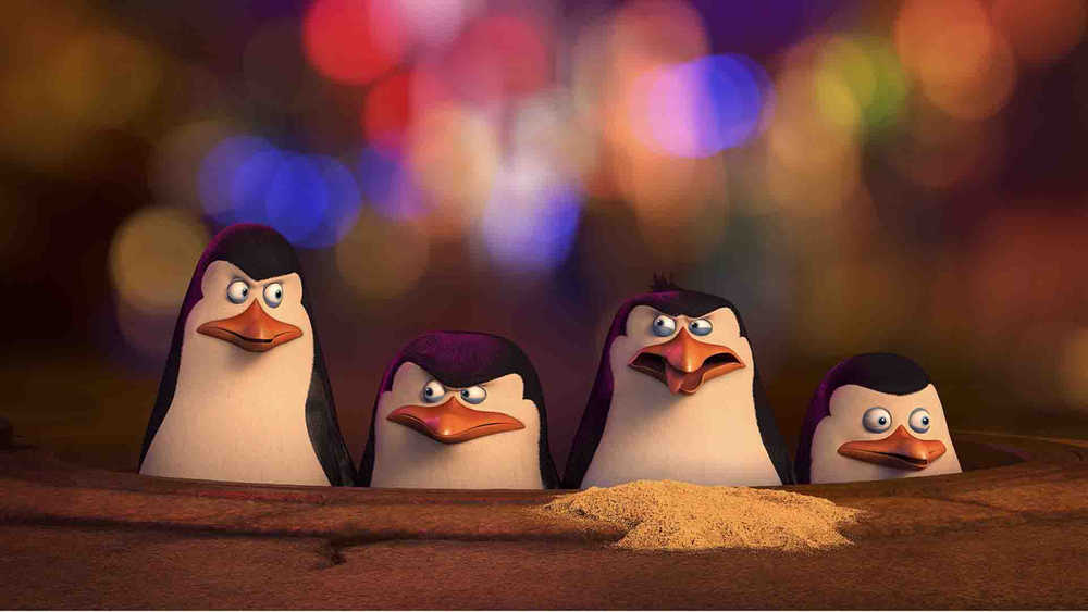 This image released by DreamWorks Animation shows, from left, Kowalski, voiced by Chris Miller, Skipper voiced by Tom McGrath, Rico, voiced by Conrad Vernon and Private voiced by Christpher Knights in a scene from, "The Penguins of Madagascar." (AP Photo/DreamWorks Animation)