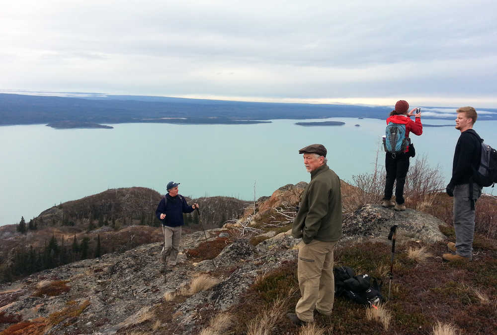Photo by Dan Balmer/Peninsula Clarion Members of the Kenai Peninsula Outdoors Club take in the view of Skilak Lake from the top of the Vista Trail during a hike Nov. 22. Club members post events on the club page on meetup.com as a way to get out and enjoy the outdoors with people with similar interests.
