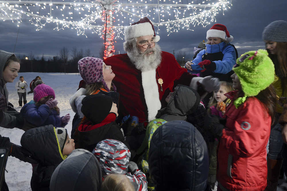 Photo by Rashah McChesney/Peninsula Clarion  Dozens of children packed close to the stage at Soldotna Creek Park where the Triumvirate Theatre put on a showing of A Charlie Brown Christmas on Saturday Dec. 6, 2014 in Soldotna, Alaska.