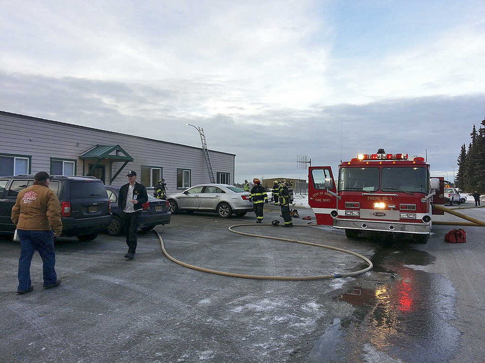 Photo by Dan Balmer/Peninsula Clarion Kenai and Nikiski firefighters responded to a noon fire at the Kenaitze Indian Tribe's administration building on Wednesday  Dec. 10, 2014 at 110 N. Willow in Kenai, Alaska.