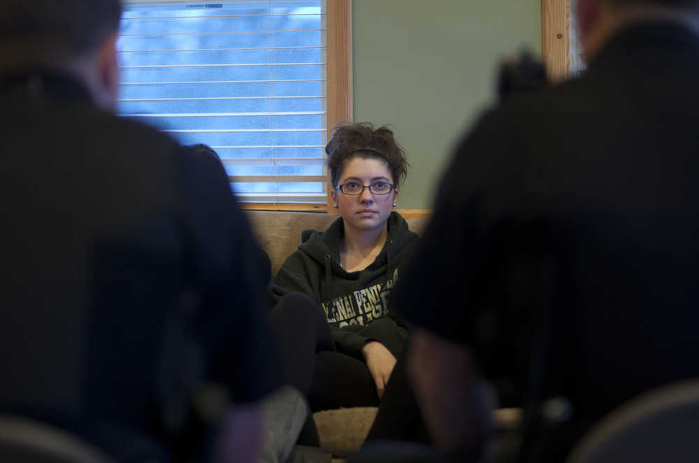Photo by Rashah McChesney/Peninsula Clarion Willow Walaszek, of Kasilof, listens to two officers from the Kenai Police Department during a Teens on Target self defense class on Thursday Dec. 11, 2014 in Kenai, Alaska.