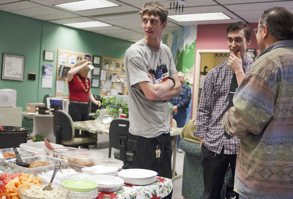 Photo by Rashah McChesney/Peninsula Clarion  Several students brought food for an English as a Second Language class potluck on Thursday Dec. 11, 2014 at Kenai Peninsula College Kenai River Campus in Soldotna, Alaska.