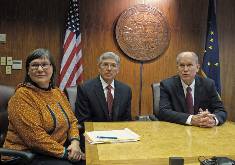 In this Monday, Dec. 1, 2014 photo, Alaska state health commissioner Valerie Davidson, left, Lt. Gov. Byron Mallott, center, and Gov. Bill Walker attend a news conference to announce Davidson's appointment in Juneau, Alaska. (AP Photo/Becky Bohrer)